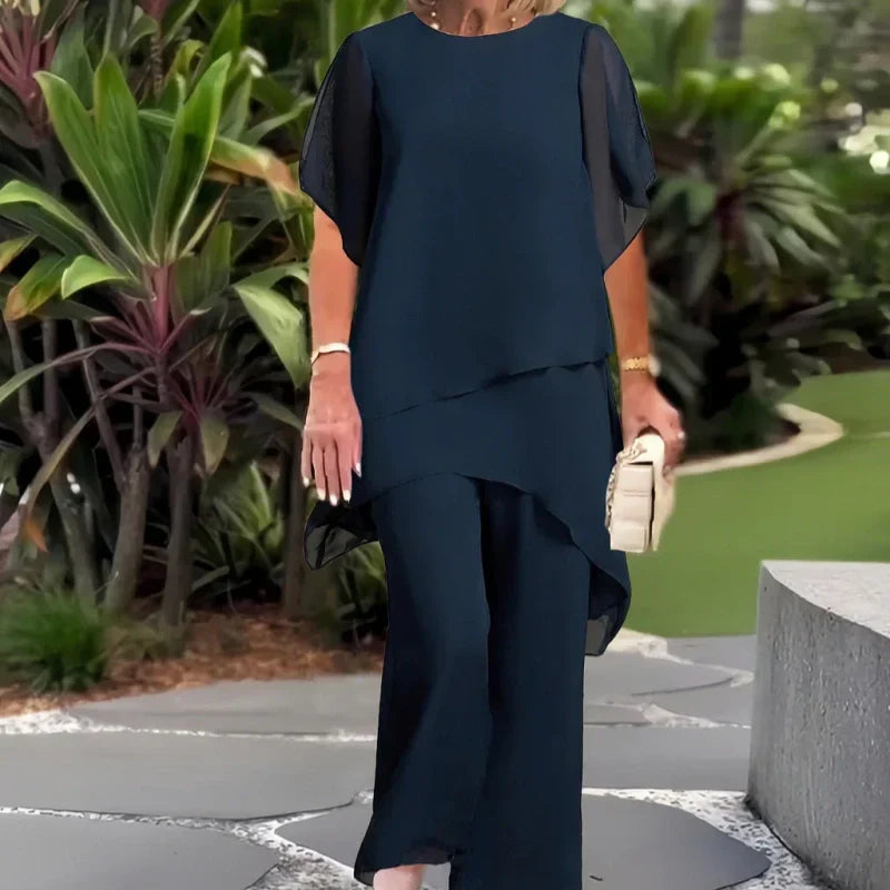 Conjunto encantador de blusa irregular e calça pantalona