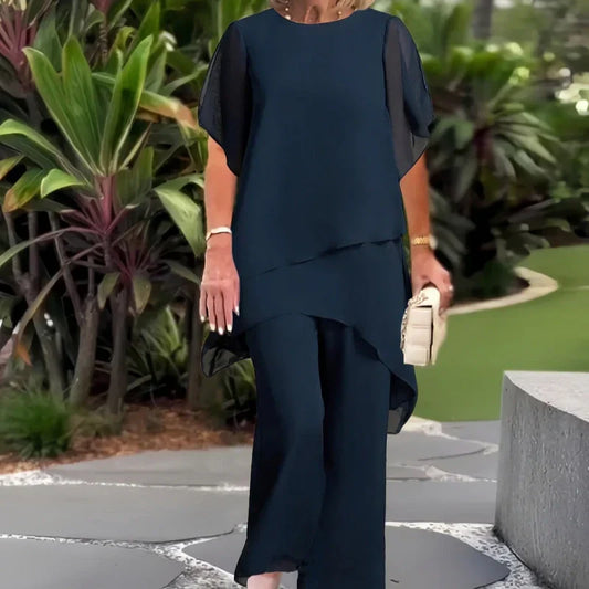 Conjunto encantador de blusa irregular e calça pantalona