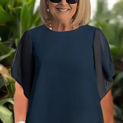 Conjunto encantador de blusa irregular e calça pantalona