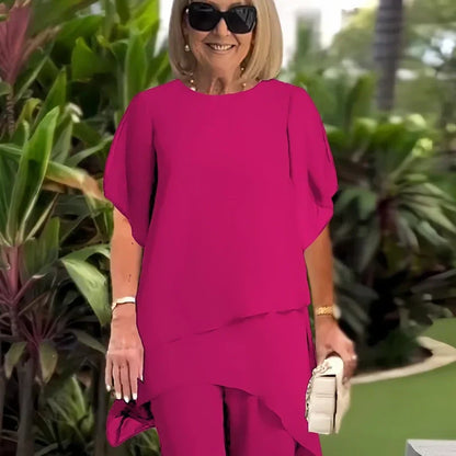 Conjunto encantador de blusa irregular e calça pantalona