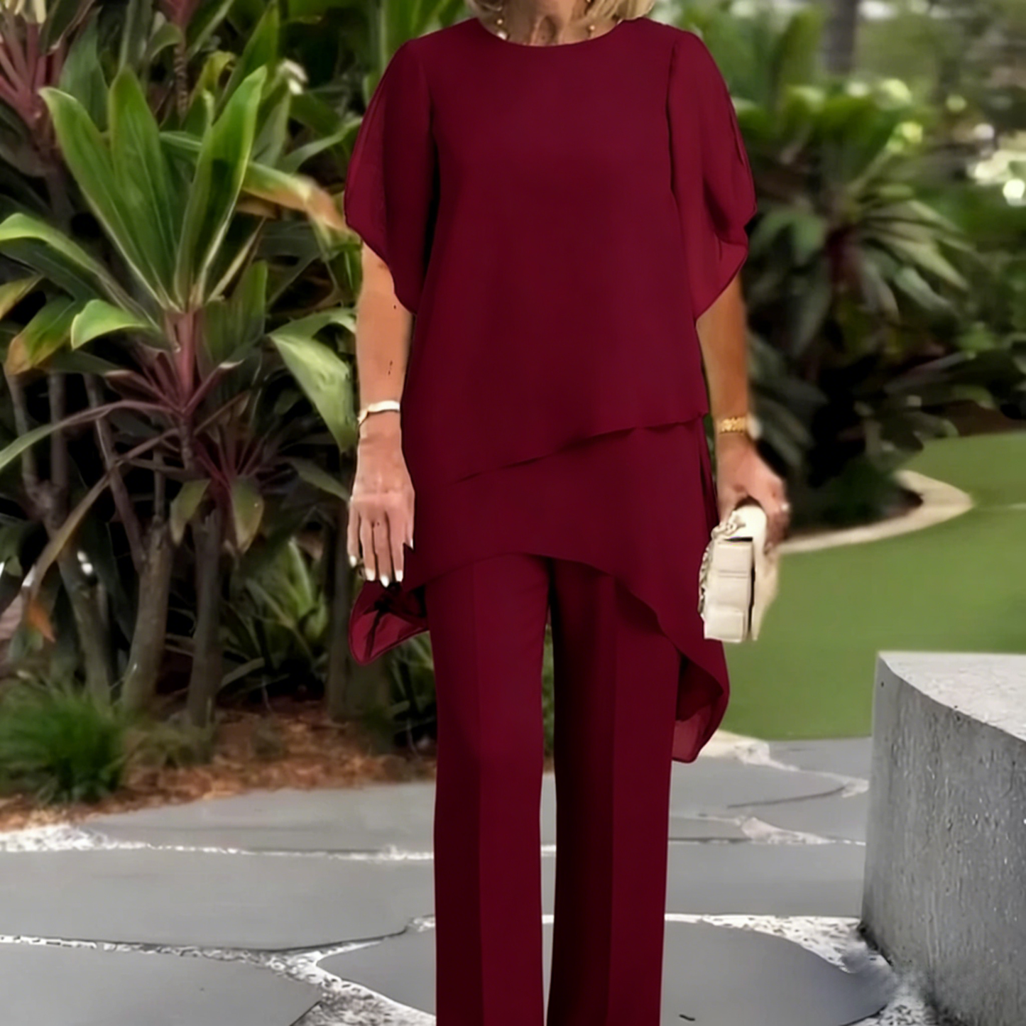 Conjunto encantador de blusa irregular e calça pantalona