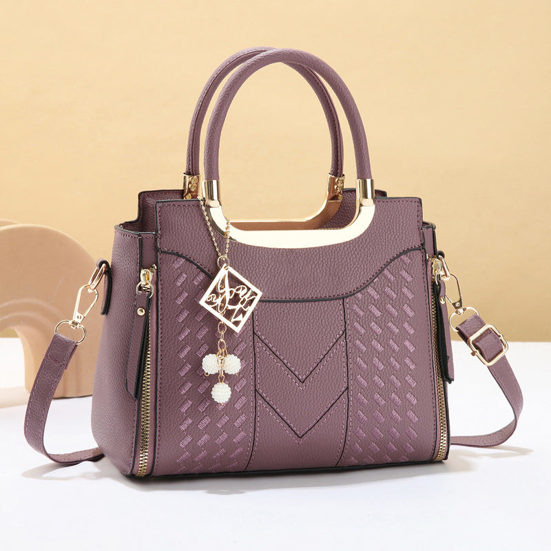 DESCONTO DE 50% POR TEMPO LIMITADO! ✨ Mala feminina com costura em V – Detalhes dourados, vários compartimentos, alça superior 🌸