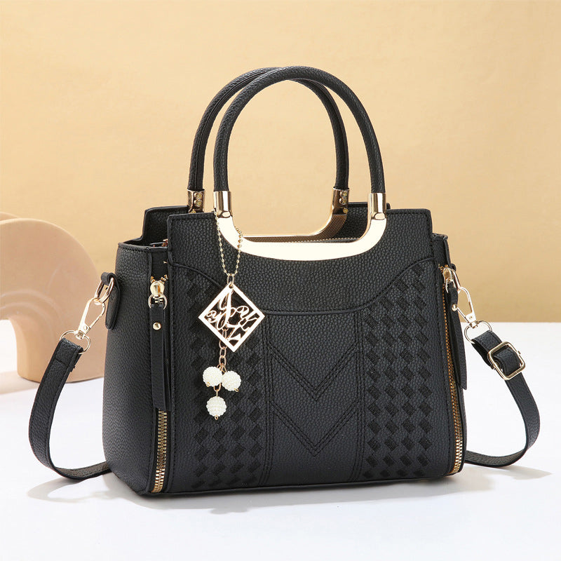 DESCONTO DE 50% POR TEMPO LIMITADO! ✨ Mala feminina com costura em V – Detalhes dourados, vários compartimentos, alça superior 🌸