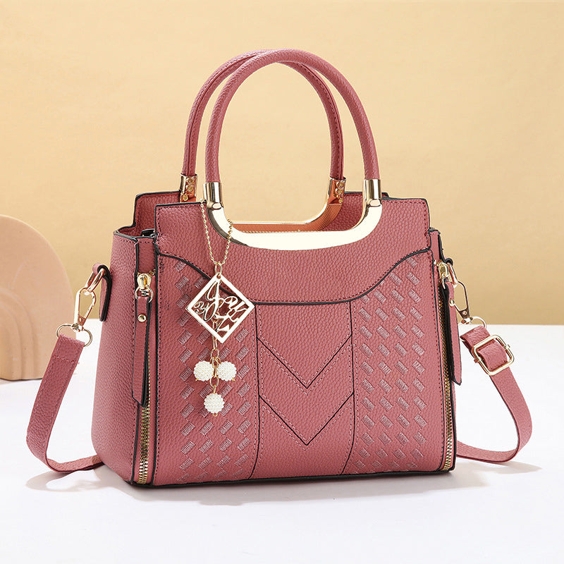 DESCONTO DE 50% POR TEMPO LIMITADO! ✨ Mala feminina com costura em V – Detalhes dourados, vários compartimentos, alça superior 🌸