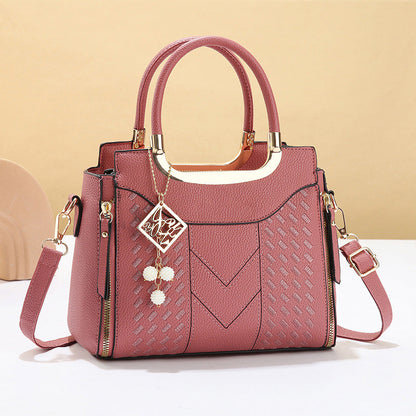 DESCONTO DE 50% POR TEMPO LIMITADO! ✨ Mala feminina com costura em V – Detalhes dourados, vários compartimentos, alça superior 🌸