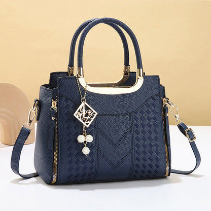 DESCONTO DE 50% POR TEMPO LIMITADO! ✨ Mala feminina com costura em V – Detalhes dourados, vários compartimentos, alça superior 🌸