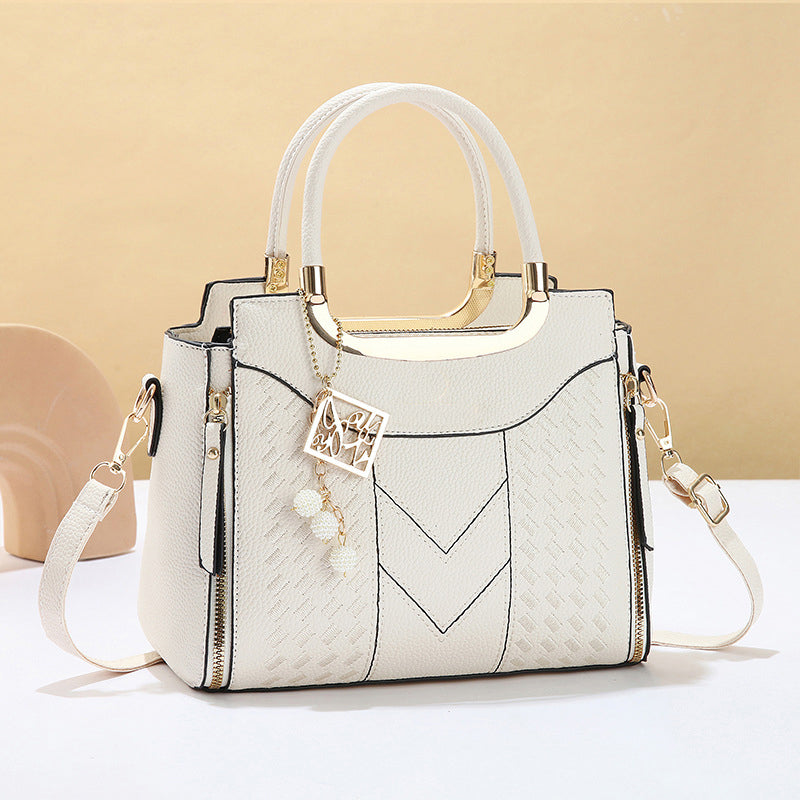 DESCONTO DE 50% POR TEMPO LIMITADO! ✨ Mala feminina com costura em V – Detalhes dourados, vários compartimentos, alça superior 🌸