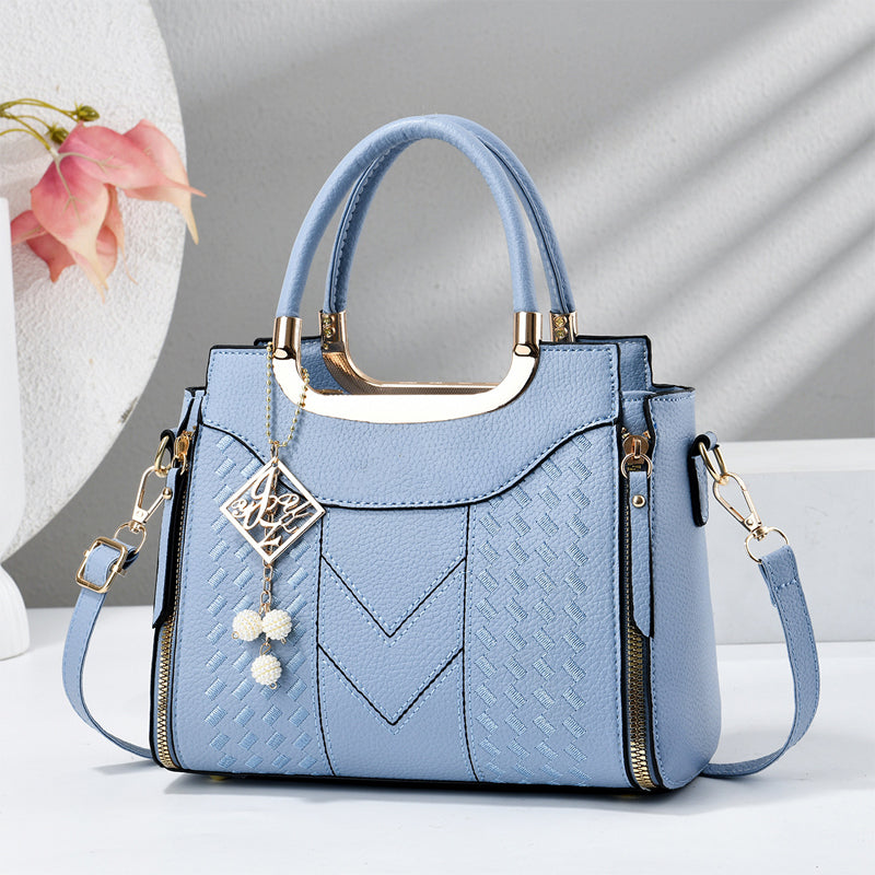DESCONTO DE 50% POR TEMPO LIMITADO! ✨ Mala feminina com costura em V – Detalhes dourados, vários compartimentos, alça superior 🌸