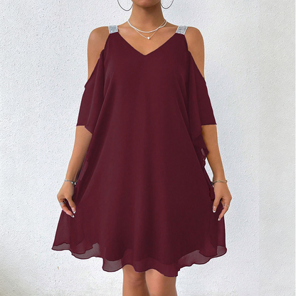 ✨👗 POR TEMPO LIMITADO, 50% DE DESCONTO! 💃Vestido comprido com decote em V e ombros à mostra – Recortes modernos e um corte elegante – Arrase em qualquer evento.